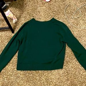Green knitted sweater